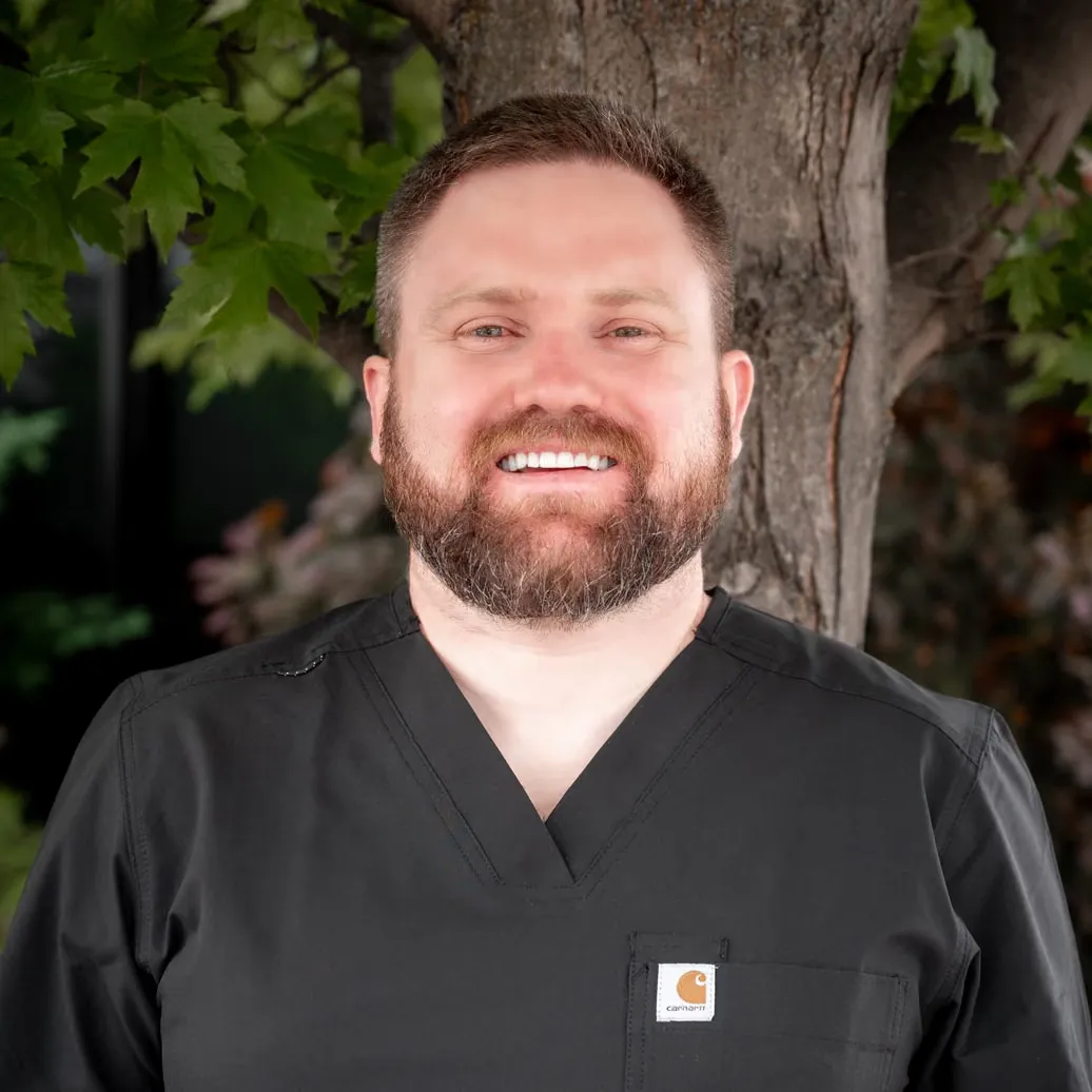 Dr. Brydan Regehr smiling outside the Vernon clinic