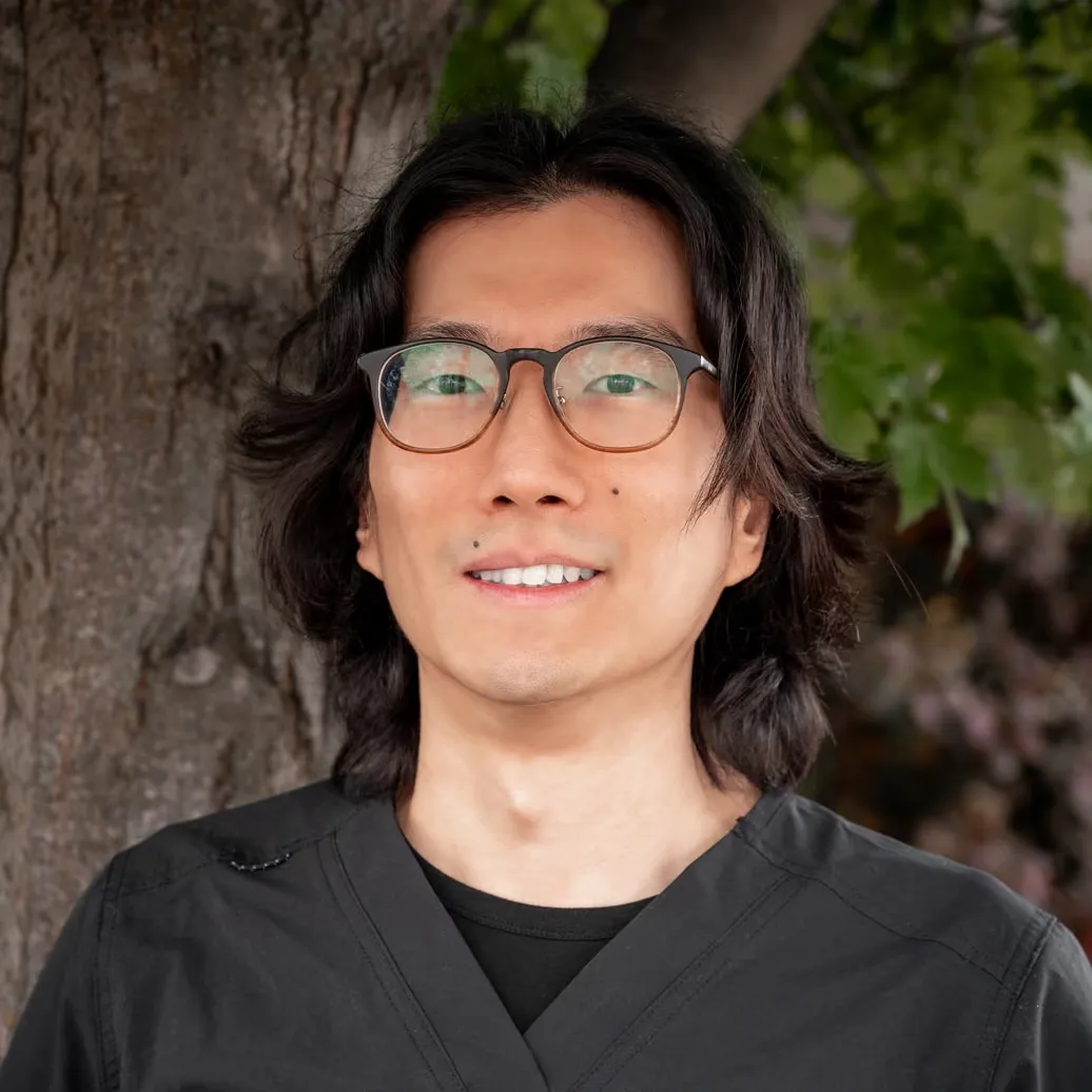 Dr. Patrick Poon smiling outside the Vernon dental clinic